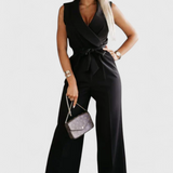 Elegant Sleeveless Montserrat Mono with Bow and Fluid Fall