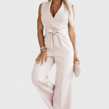 Elegant Sleeveless Montserrat Mono with Bow and Fluid Fall
