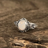 Retro silver ring with flowers and opal