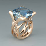 Retro ring in rose gold with blue zirconia