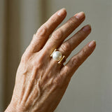 Gold retro ring with pearl inlays