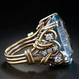 Retro gold ring with layers of blue zirconia