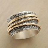 Retro spinning ring with baroque design
