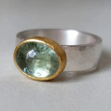 Retro green ring with round stone