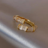 Adjustable Luxury Ring with White Opal in Gold