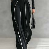 Emma – Elegant two-piece set with high collar and wide-leg pants