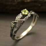 vintage silver ring with green leaf-shaped stone