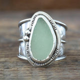 Vintage ring with green moonstone coating