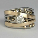 Vintage ring with cubic zirconia and gold inlays