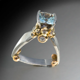 Vintage gold and silver ring with blue zirconia